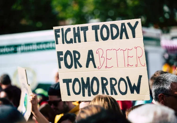 BioSample affiche d'une lutte pour l'avenir dans une manifestation