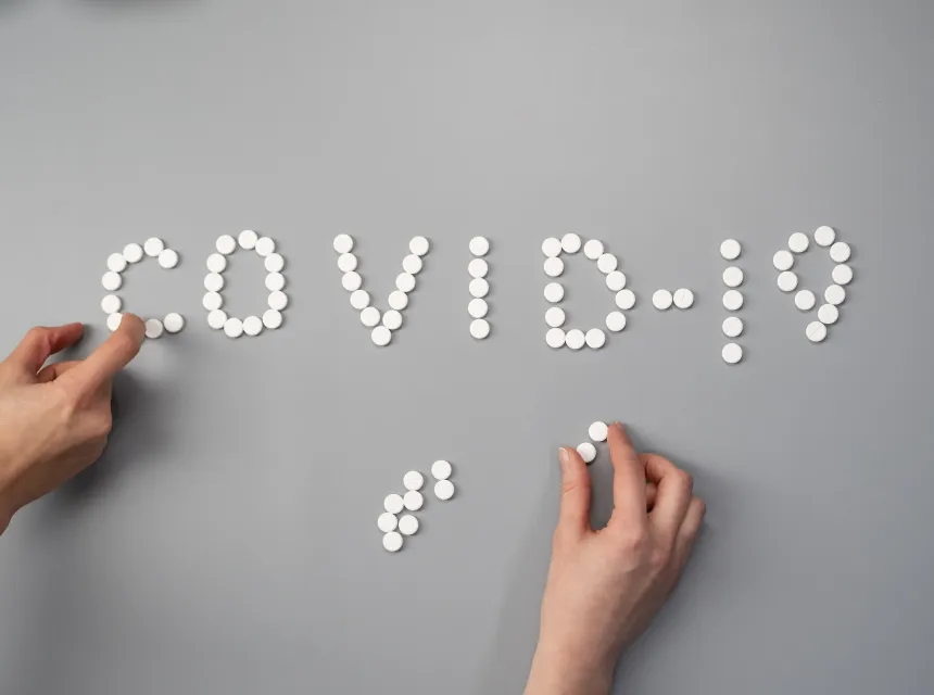 BioSample COVID écrit en perles blanches