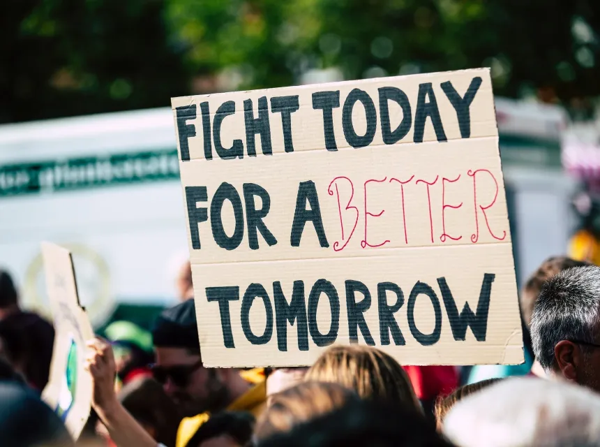 BioSample affiche d'une lutte pour l'avenir dans une manifestation